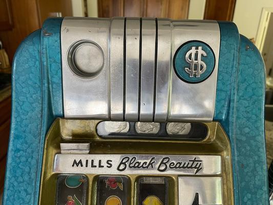 1940's Mills Black Beauty High Top Dollar Slot Machine Image