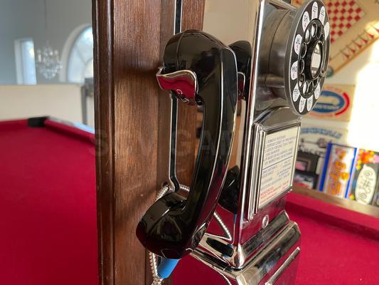 1960's Western Electric 233 Chrome 3-Slot Payphone Image