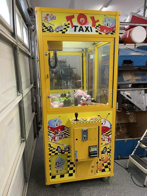 2010 Betson Enterprises Toy Taxi Claw Machine